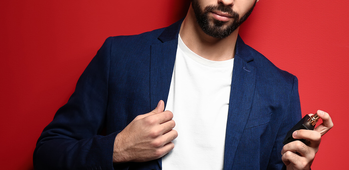 Man spraying aftershave