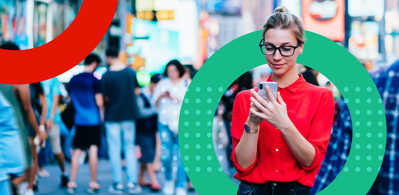 Women walking down the street on mobile