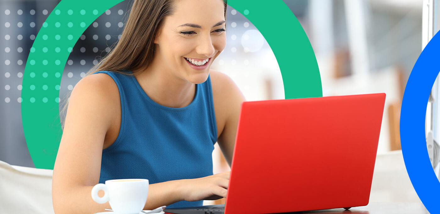 Happy customer on her laptop entering preference data