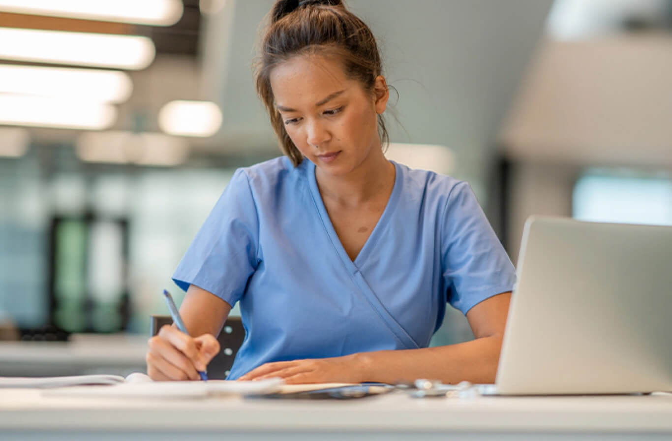 Junior Doctor writing a note