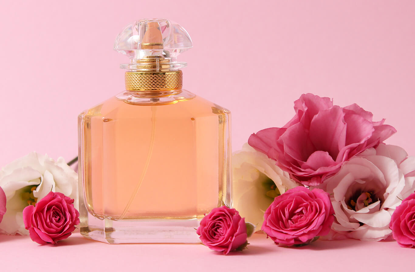 Perfume bottle with pink flowers