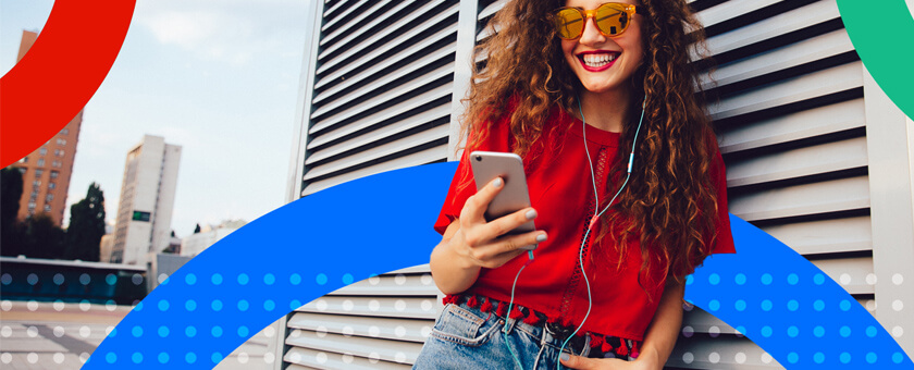 Trendy women reading on mobile phone