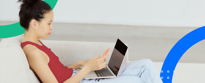 Women making a purchase on laptop