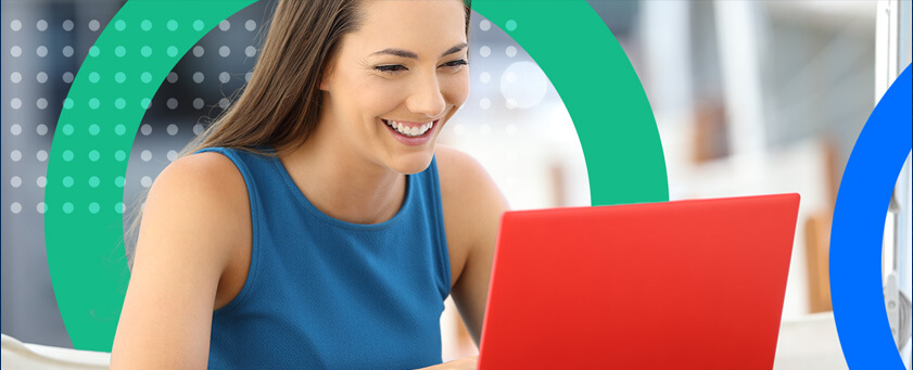 Happy customer on her laptop entering preference data